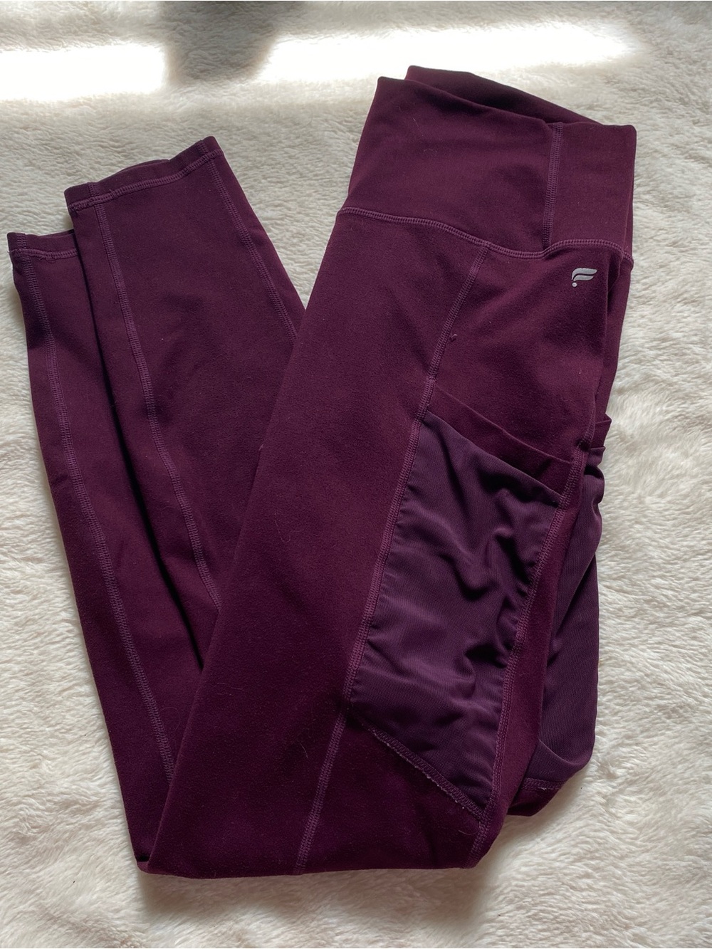 Fabletics PowerHold Leggings with mesh side pockets - Burgundy
